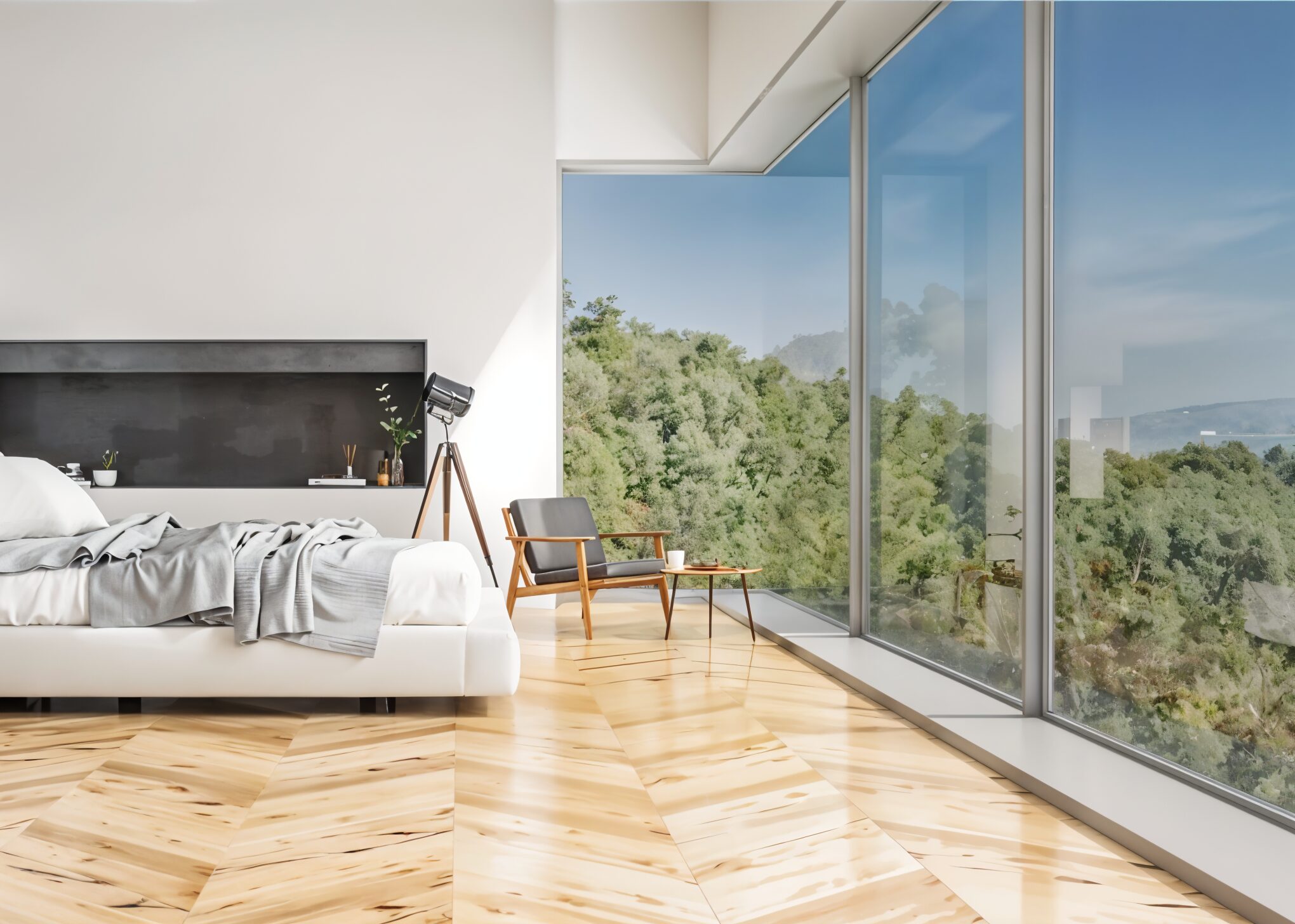 Minimalist bedroom with wooden floors and full-wall glass windows showing forest view.